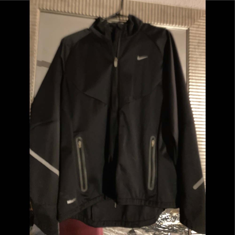 Nike running/biking thicker jacket. Reflective Arm